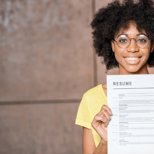  woman handing over her resume